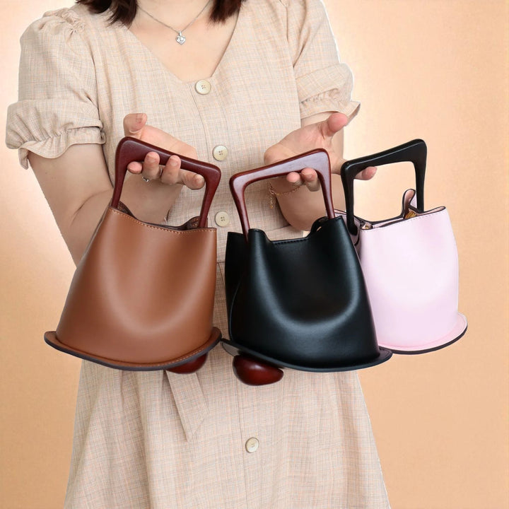 Bolso tipo cubo de piel de vacuno para mujer