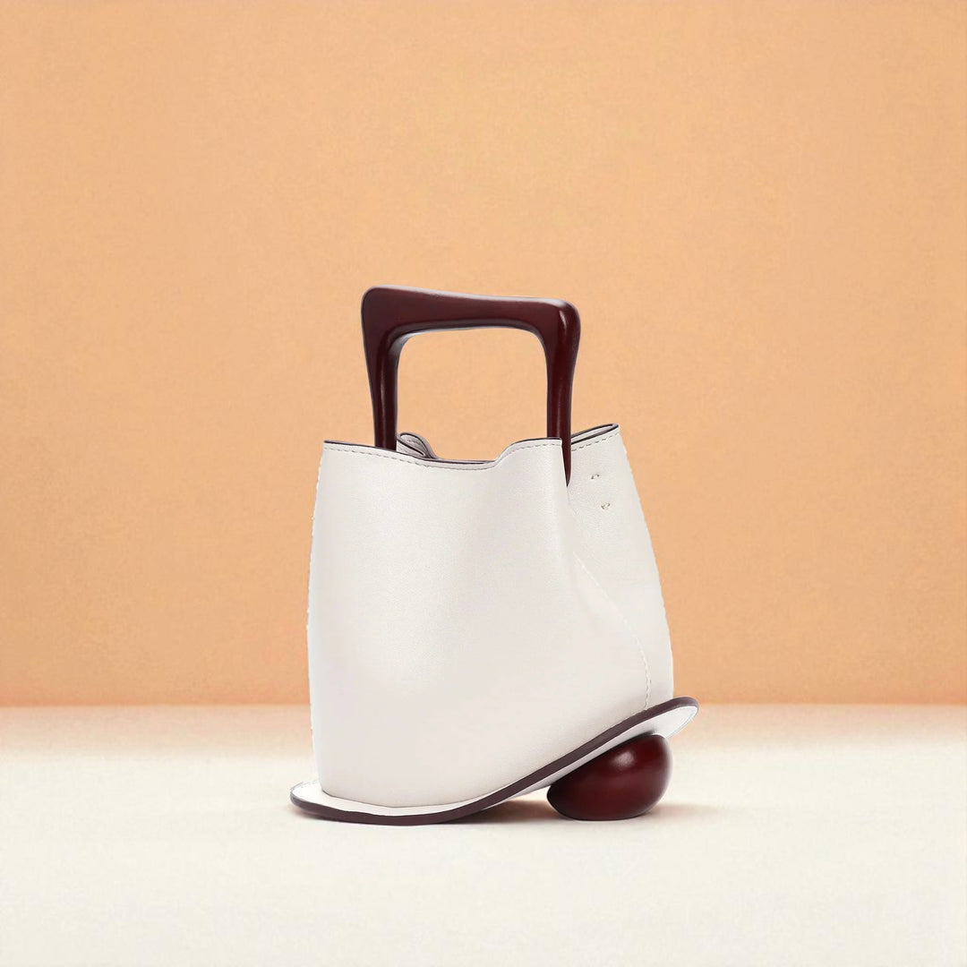 Bolso tipo cubo de piel de vacuno para mujer