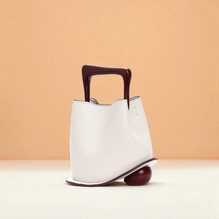 Bolso tipo cubo de piel de vacuno para mujer