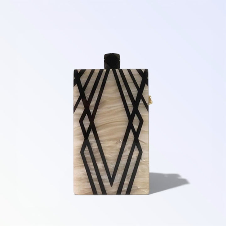 Clutch acrílico de rayas irregulares