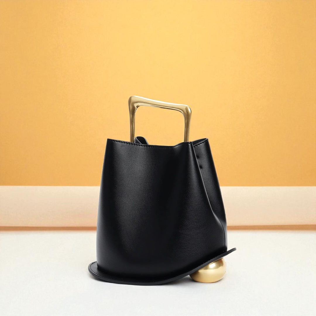 Bolso tipo cubo de piel de vacuno para mujer