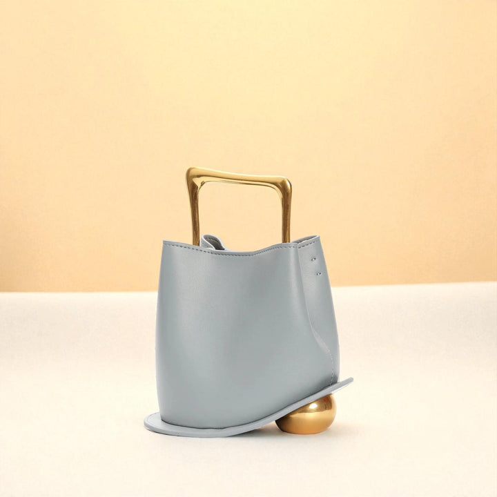 Bolso tipo cubo de piel de vacuno para mujer
