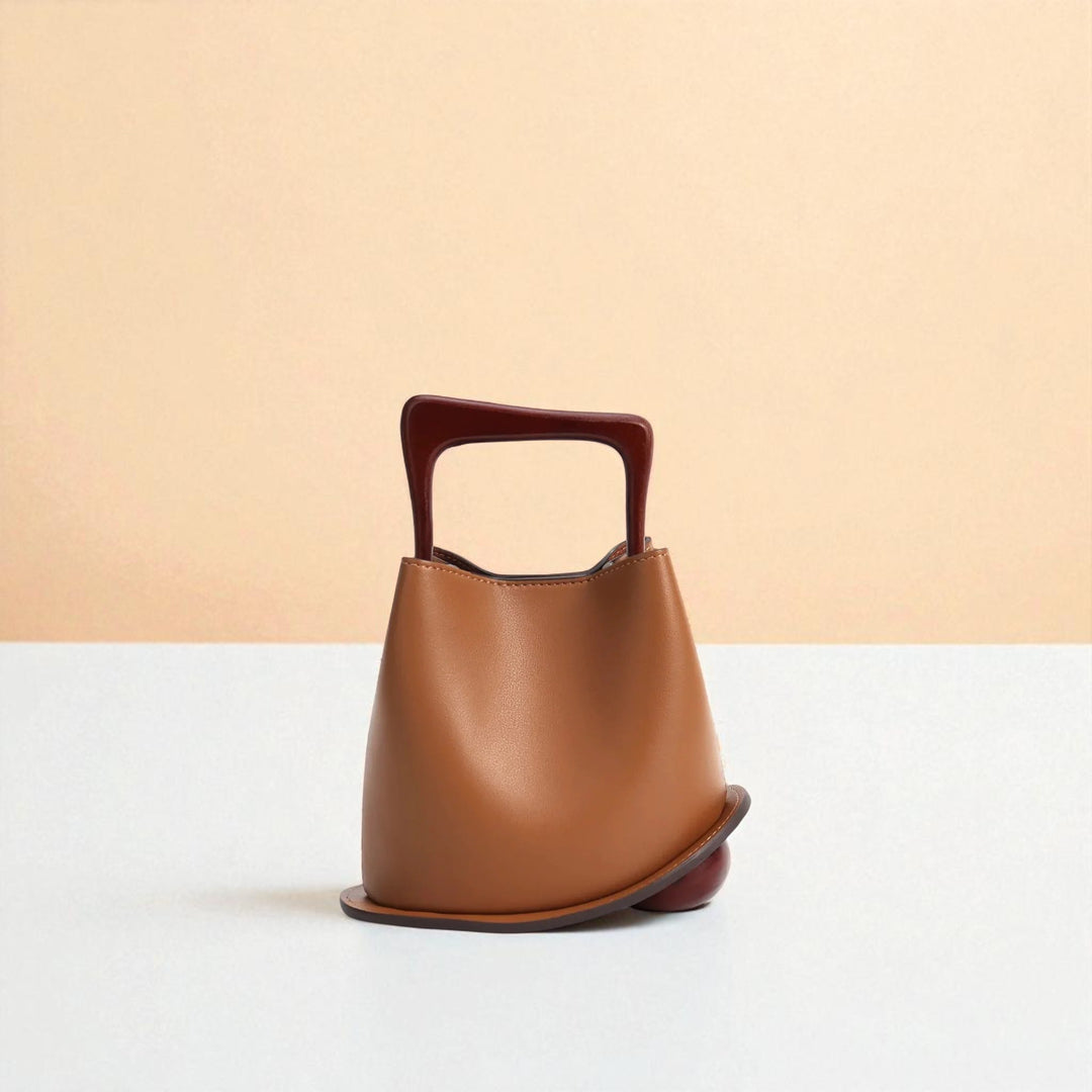 Bolso tipo cubo de piel de vacuno para mujer