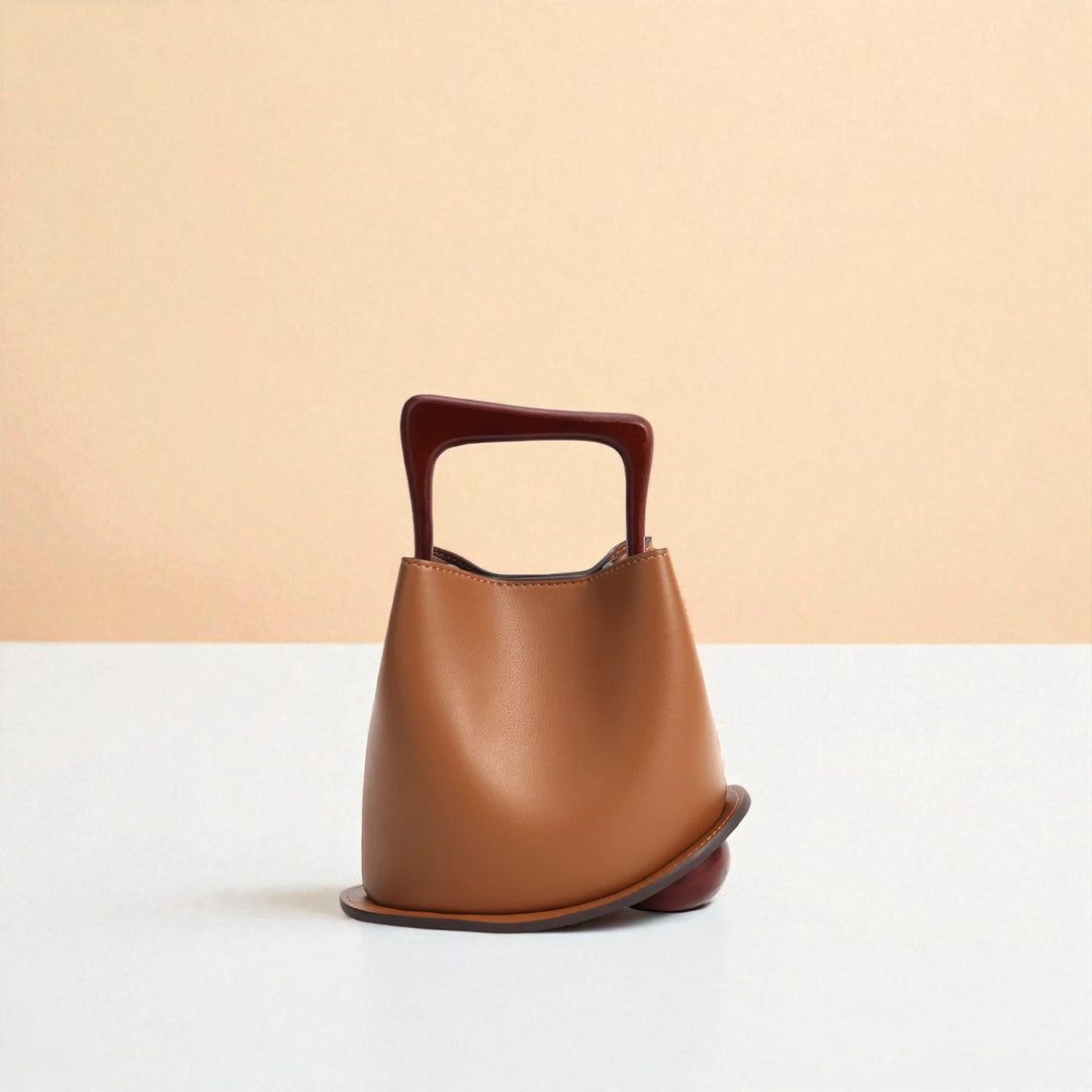 Bolso tipo cubo de piel de vacuno para mujer