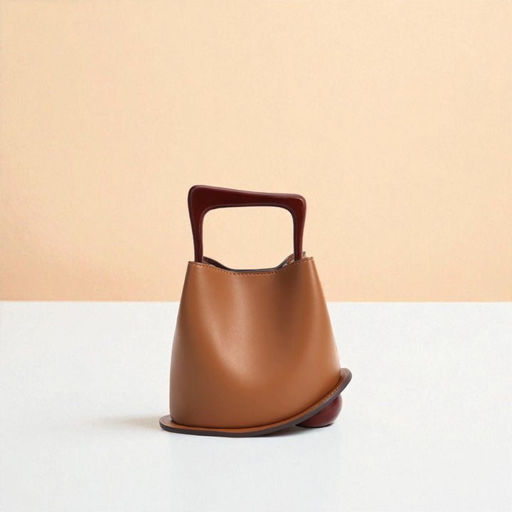 Bolso tipo cubo de piel de vacuno para mujer