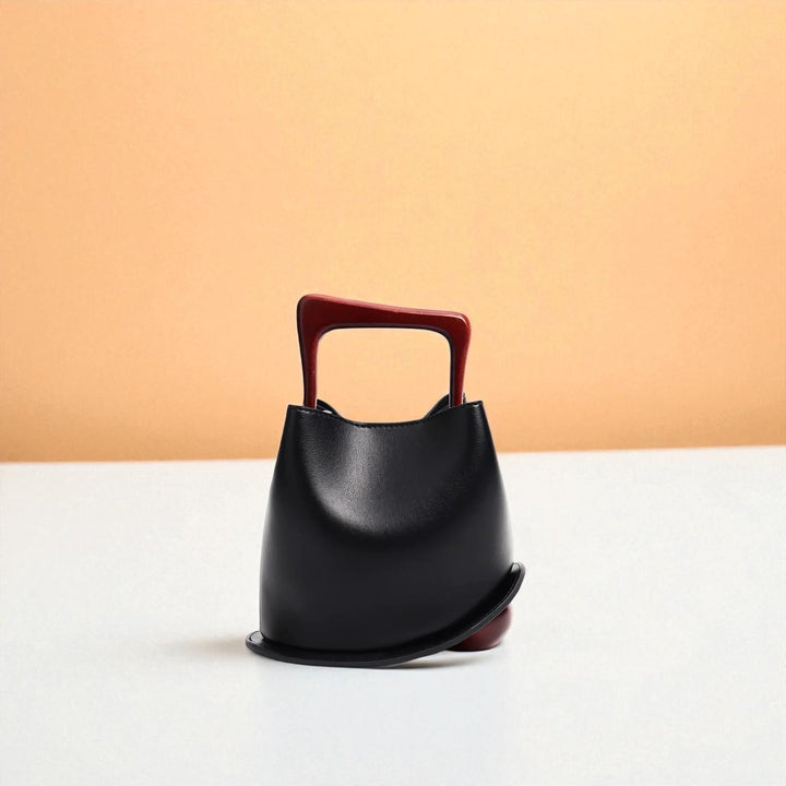 Bolso tipo cubo de piel de vacuno para mujer