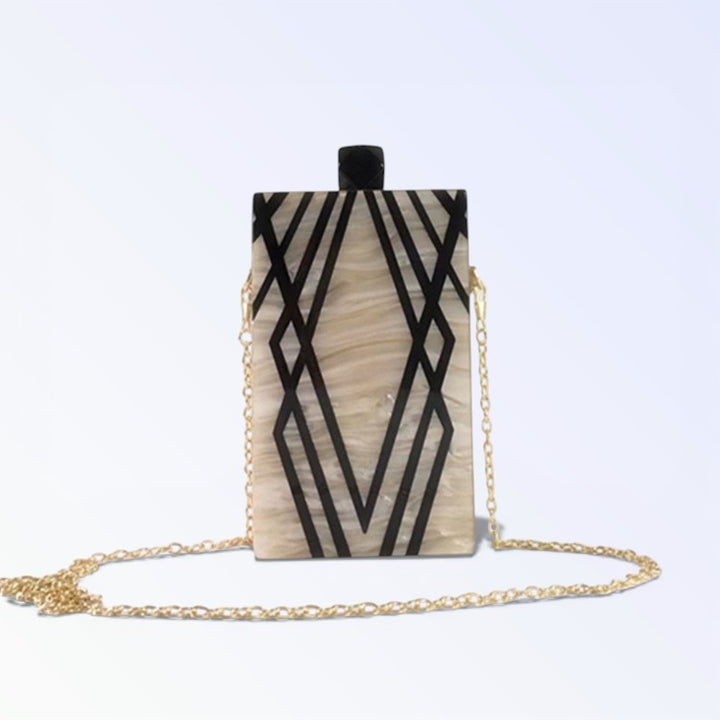 Clutch acrílico de rayas irregulares