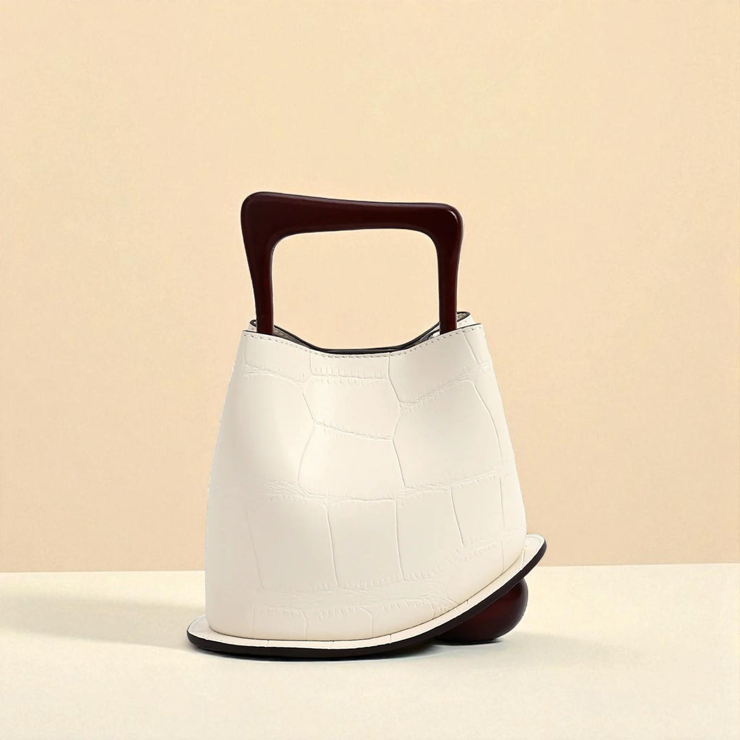 Bolso tipo cubo de piel de vacuno para mujer